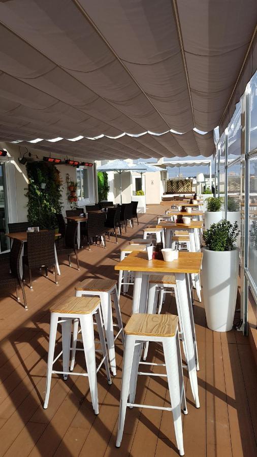 לוגו Hotel Mendez Nunez מראה חיצוני תמונה