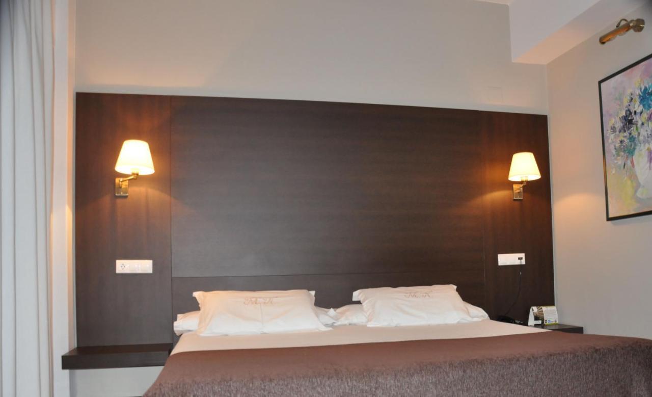 לוגו Hotel Mendez Nunez מראה חיצוני תמונה