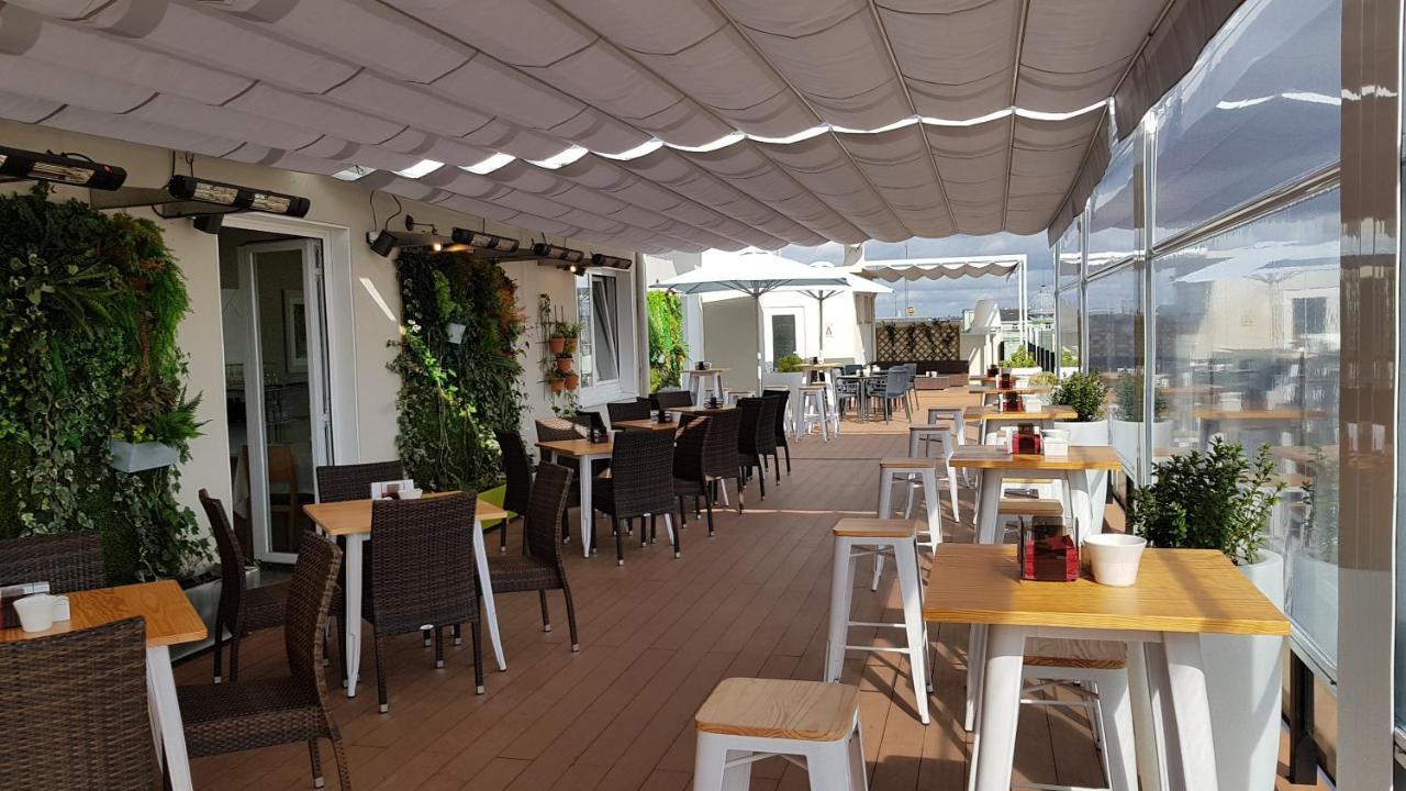 לוגו Hotel Mendez Nunez מראה חיצוני תמונה