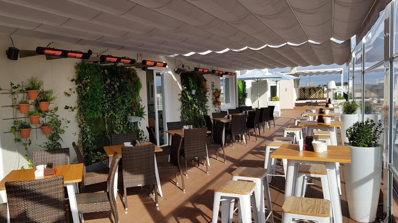 לוגו Hotel Mendez Nunez מראה חיצוני תמונה